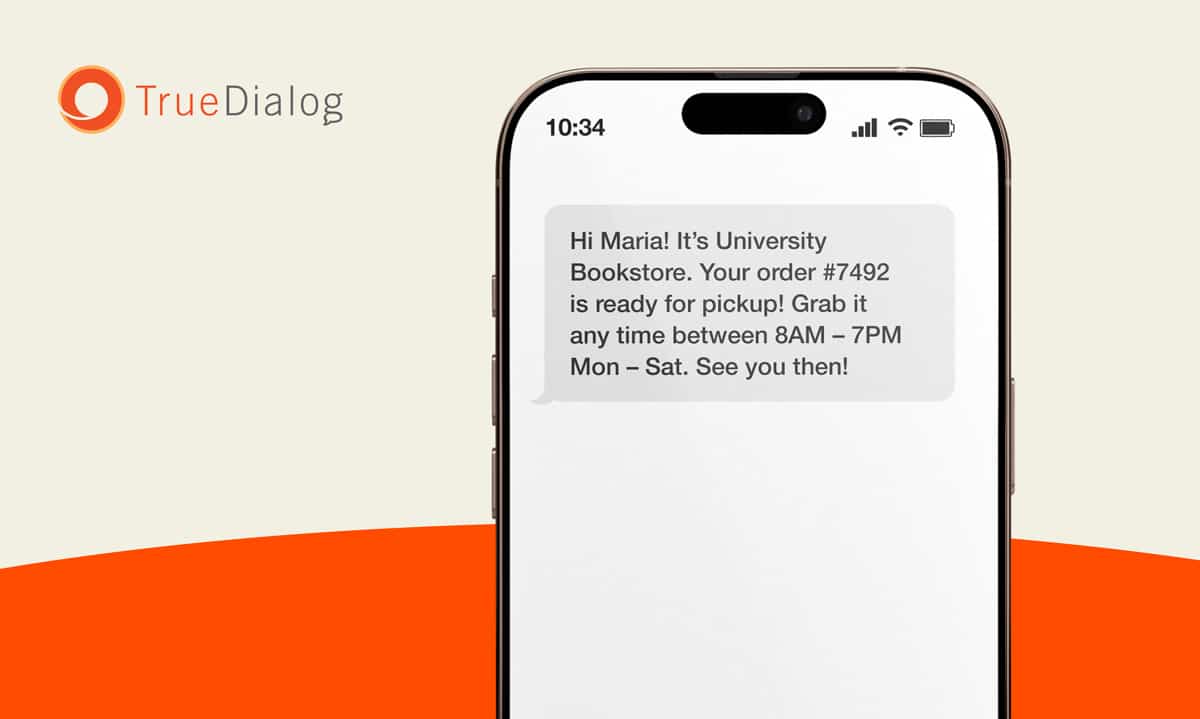 A phone with a text message telling the recipient that an order from the university bookstore is ready for pickup