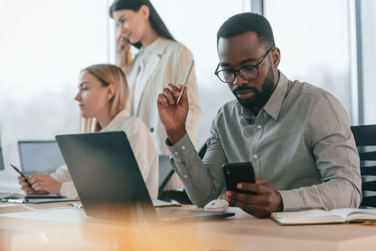 Business man using mass texting service