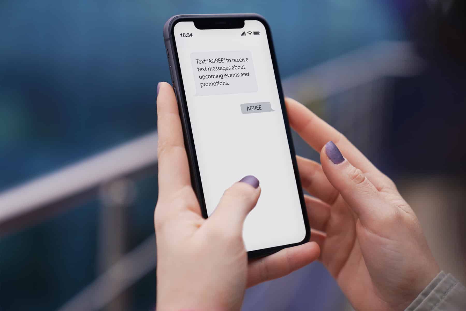 Woman opting in to receive marketing text messages